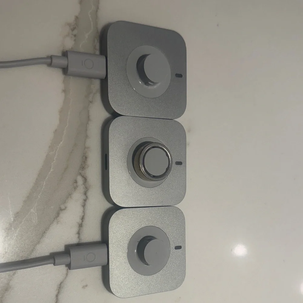 Oura ring gen 4. ring size 5. 3 charging docks included